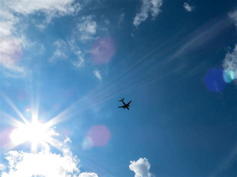 Free Images : horizon, bokeh, cloud, sky, sun, sunlight, fly, aircraft, blue, freedom, clouds ...