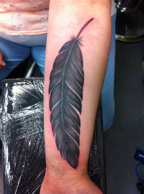 57 Attractive Wrist Feather Tattoos