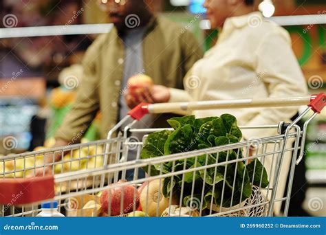 Shopping Cart with Fresh Fruits and Vegetables and Couple on Background Stock Photo - Image of ...