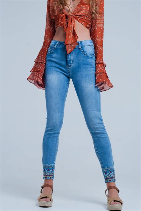 JEANS WITH EMBROIDERY BY THE HEMS | Online shopping clothes, Light denim jeans, Embroidery jeans