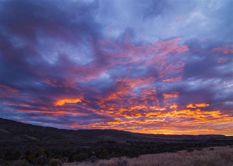 Dramatic sunrise over Boise Hills in Boise Idaho Photograph by ...