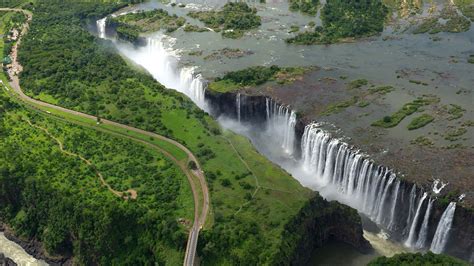 Aerial view of Victoria Falls waterfall on the Zambezi River between ...