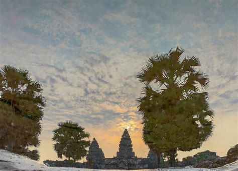 Reflection of sunrise in Angkor Wat Photograph by Karen Foley - Fine Art America