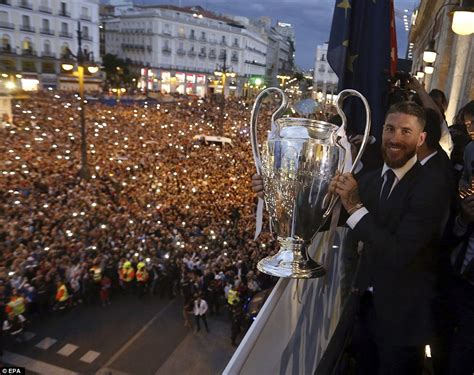 Real Madrid continue wild Champions League celebrations as thousands of fans gather to toast ...