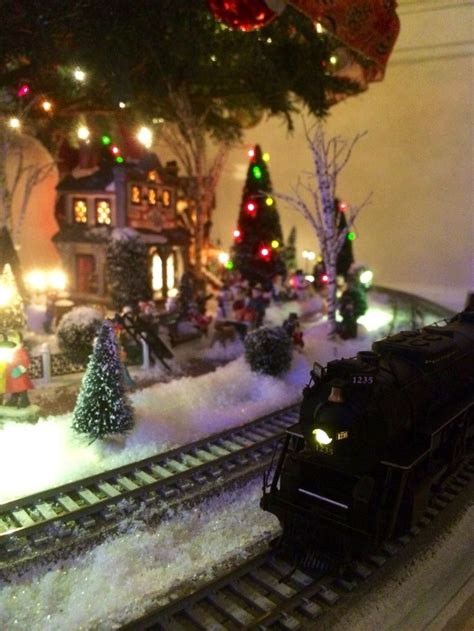 Our Christmas train layout around our tree (Love it) | Christmas tree ...