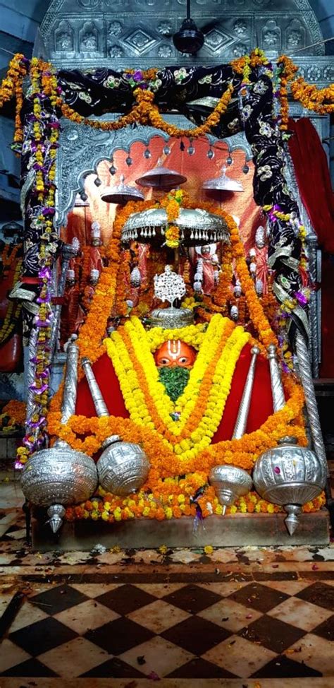 Free Photo: Hanuman Garhi Mandir's idol in Ayodhya decorated with flowers by Najim