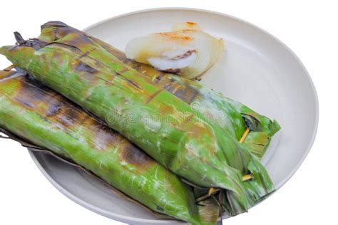 Thai Food: Sticky Rice in Coconut Milk, Seasoned, Stuffed with Young Coconut, Wrapped in Banana ...