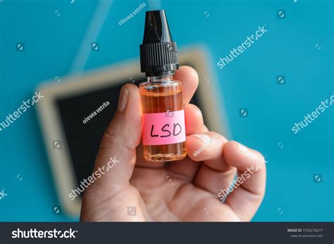 Hand Holding Lsd Liquid Bottle Conceptual Stock Photo 1535278277 | Shutterstock