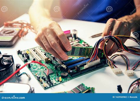 Computer Assembly - Technician Install Ram Memory Module on Motherboard Stock Photo - Image of ...