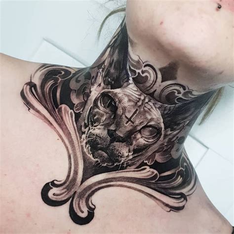 Sphynx tattoo on the neck.