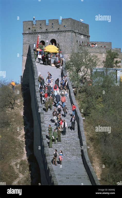 China, Beijing, Great Wall of China, visitors walking on carriageway to ...