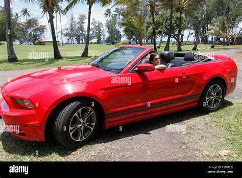 Red Ford Mustang convertible car Stock Photo - Alamy