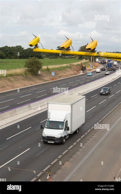 Average speed cameras on the M6 motorway in Cheshire,UK Stock Photo - Alamy