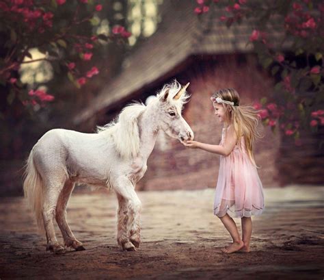 Unicorn photography session. Little girl and unicorn. She was born to ...