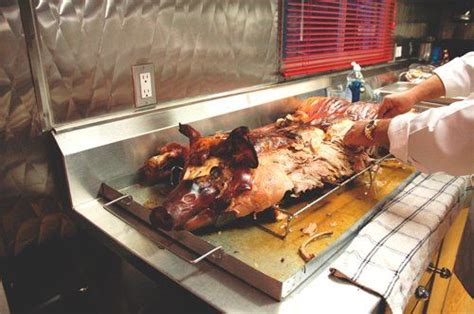 WHOLE PIG ROAST CATERING About Us