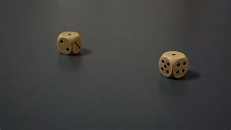 Dice Roll Two Wooden Dice Rolling Stock Footage Video (100% Royalty-free) 1072944089 | Shutterstock