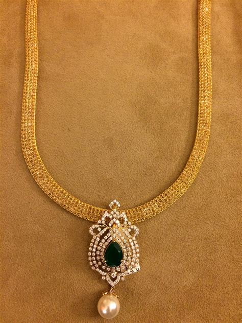 Jewellery Designs : #@ Gold Mesh Chain Designs with Simple Lockets