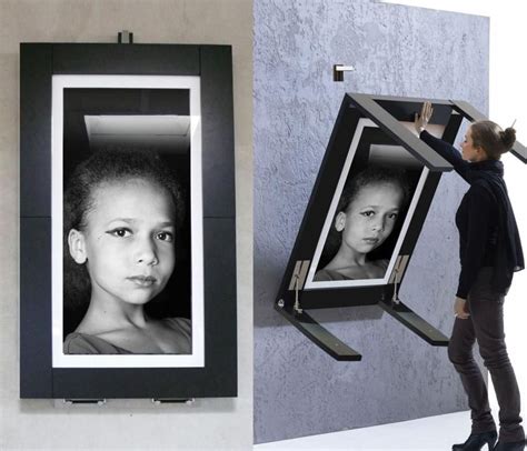 The Picture Table is a large picture frame that can detach from the wall and fold out into a ...