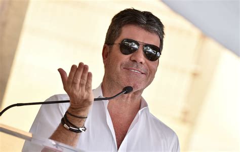 Simon Cowell misses 'The X Factor' live show after 'falling down the stairs' - NME