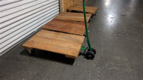 Lot #50: Four Wheel Dolly Carts with Handle - WireBids