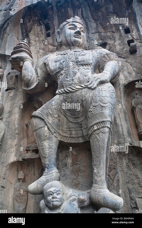 Carved statue, Fengxian Temple, Longmen Grottoes and Caves, Luoyang ...