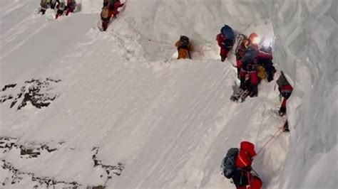 Mountaineer denies climbing over dying porter on K2 while in pursuit of ...