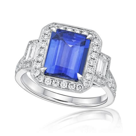 Exceptional Emerald Cut Tanzanite & Diamond Ring