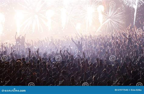 New Year Concept - Cheering Crowd and Fireworks Stock Image - Image of ...