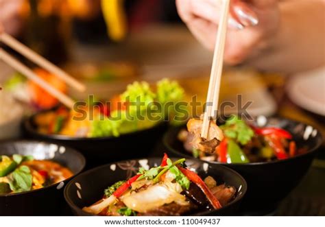 Young People Eating Thai Restaurant They Stock Photo (Edit Now) 110049437