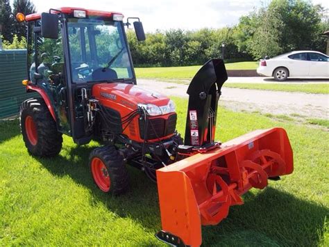 2011 B 3000 Kubota Tractor w/ 5 Ft Snowblower