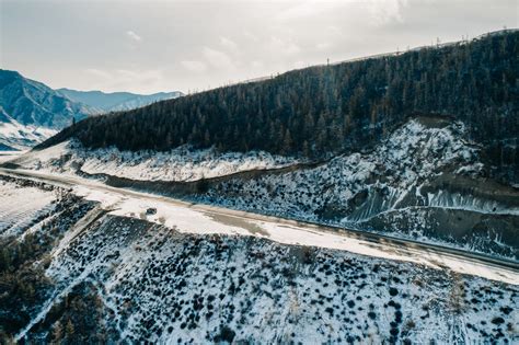 Road Through Snow Covered Mountain · Free Stock Photo