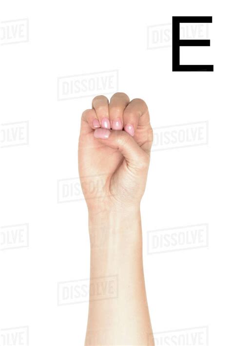 Female hand showing latin letter - E, sign language, isolated on white - Stock Photo - Dissolve