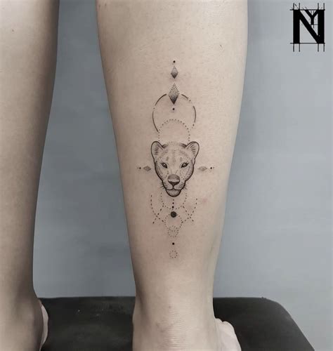 calf tattoo lioness | Lioness tattoo, Small lion tattoo for women, Small lion tattoo