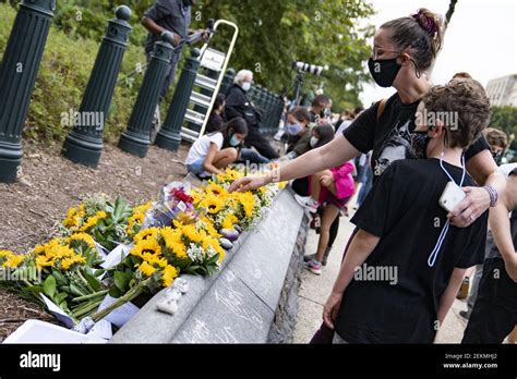 People view a memorial across the street from Justice Ruth Bader ...