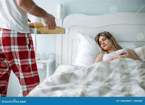 Portrait of Young Loving Couple in Bedroom Stock Photo - Image of love, happy: 139836884