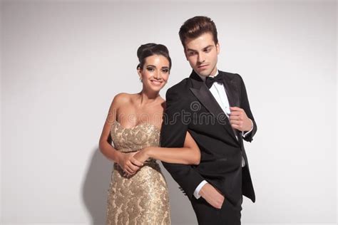 Portrait of an Elegant Couple Holding Arms Stock Photo - Image of ...