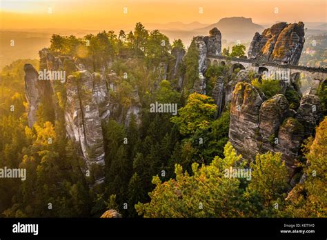 View of Bastei bridge, Bastei at sunrise, in the back the Lilienstein, Elbe Sandstone Mountains ...