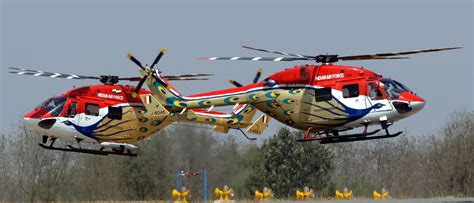 Two HAL Dhruv helicopters of the Sarang Display Team (IAF) [3554×1528] : r/MilitaryPorn