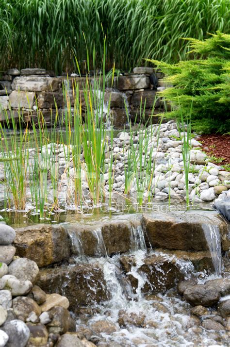 Waterfall IN Flower Garden Stock Photos - FreeImages.com