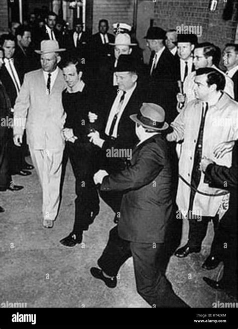 Lee Harvey Oswald being shot by Jack Ruby as Oswald is being moved by police, 1963 Stock Photo ...