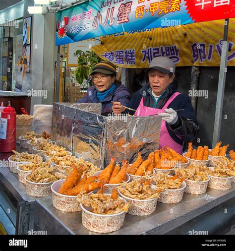 Street Food at Myeongdong Market in Seoul, South Korea Stock Photo - Alamy