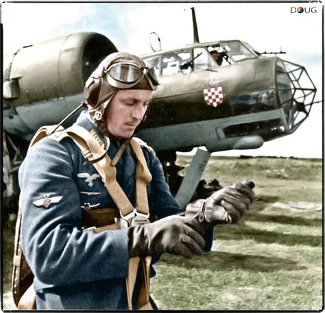 A Croatian Oberfeldwebel pilot of 10.(kroatische)/Kampfgeschwader 3 standing by his Dornier Do ...