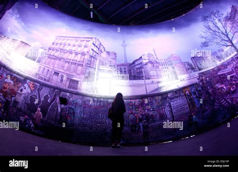 A reporter observes a panorama designed by artist Yadegar Asisi ...