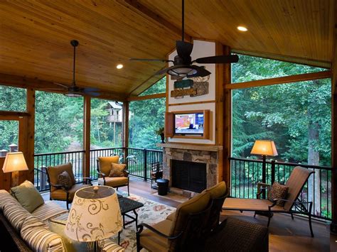 A Rustic Covered Porch with a Fireplace and TV Screen Centerpiece | HGTV # ...