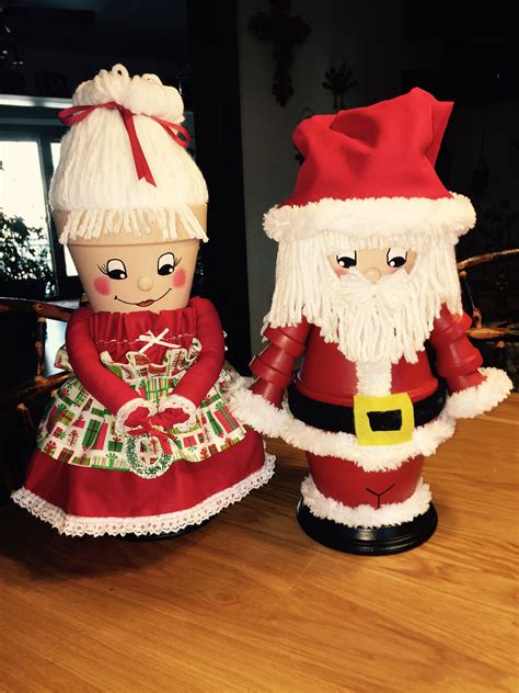 Mr & Mrs Claus all ready for the holidays. Christmas Pots, Christmas Arts And Crafts, Diy ...