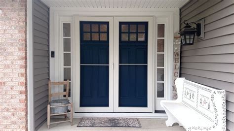 Even on a gloomy day, this front entry, show casing a Casco Full View Double Storm Door , will ...