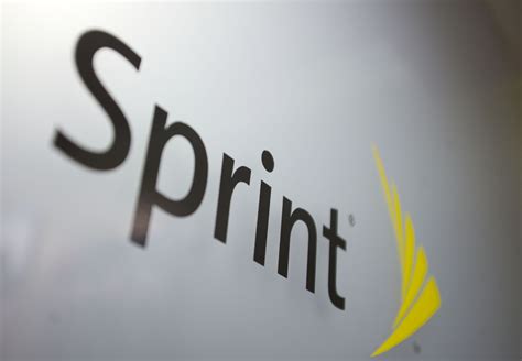 A Sprint Nextel Corp. logo is seen inside a store in New Yor – TechCrunch