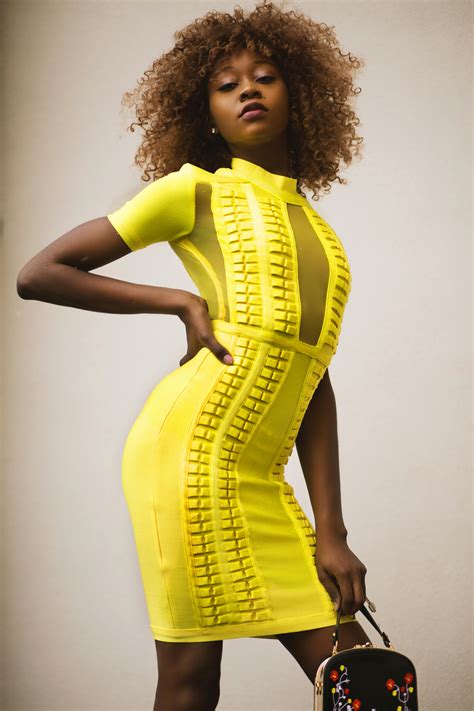 Curly Haired Woman in Yellow Bodycon Dress · Free Stock Photo