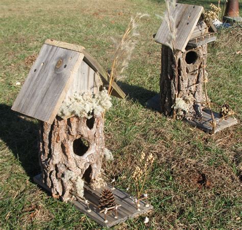 Bird houses made out of found hollowed out naturally logs. | Bird houses, Bird house, Garden art