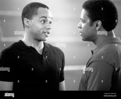 REMEMBER THE TITANS, from left: Donald Faison, Denzel Washington, 2000. ph: Tracy Bennett ...